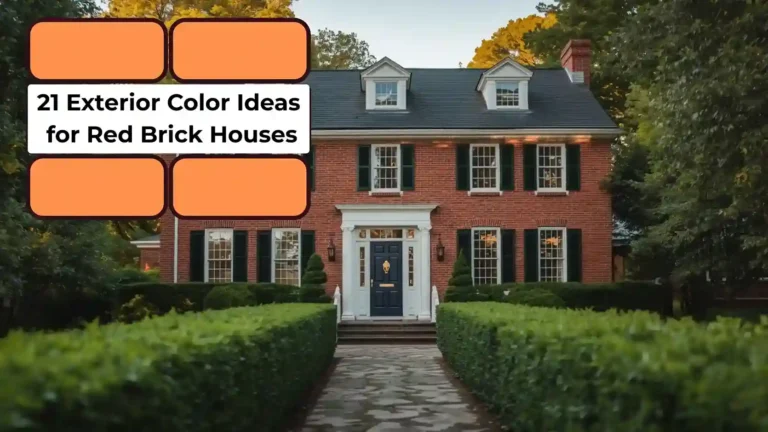 Red brick house, white trim, navy blue door.