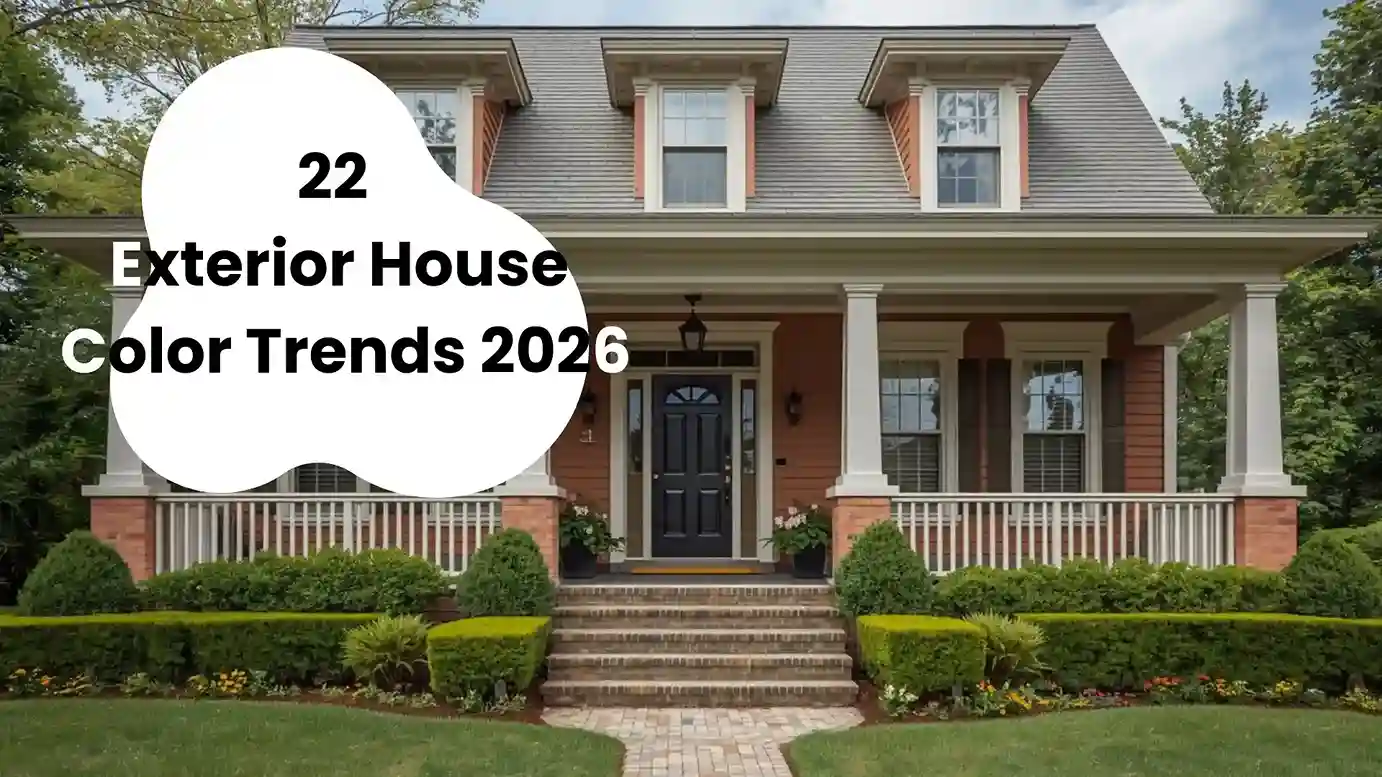 Modern craftsman home painted in warm terracotta with white trim and black accents exterior house color trends 2026