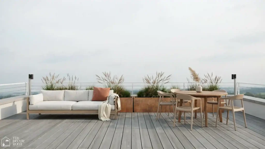 Deck design ideas with a minimalist daybed lounge zone and outdoor dining area separated by large planter boxes on a composite deck