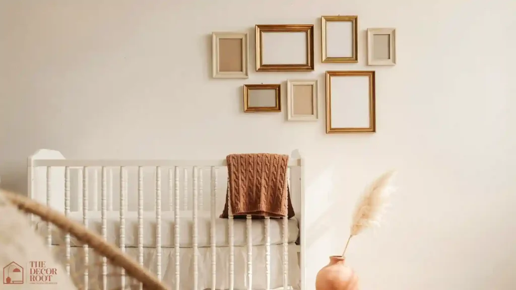 Thrifted gallery wall and scalloped crib skirt styling in a budget nursery